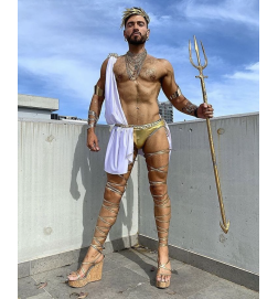 The gorgeous @colinzaid looking incredible in accessories and metallic leg wraps from House of Priscilla!
